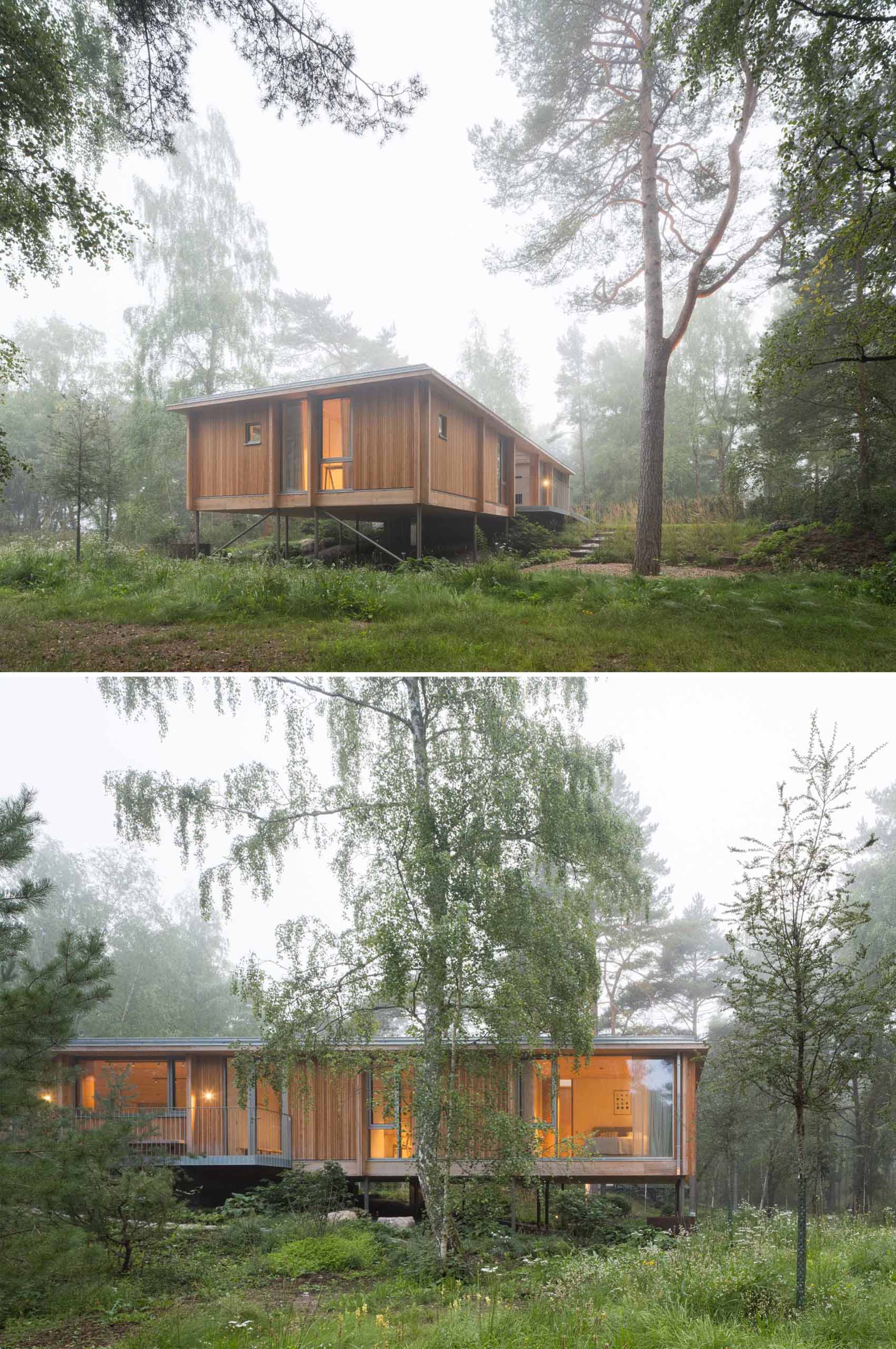 An elevated summer home clad in larch wood.