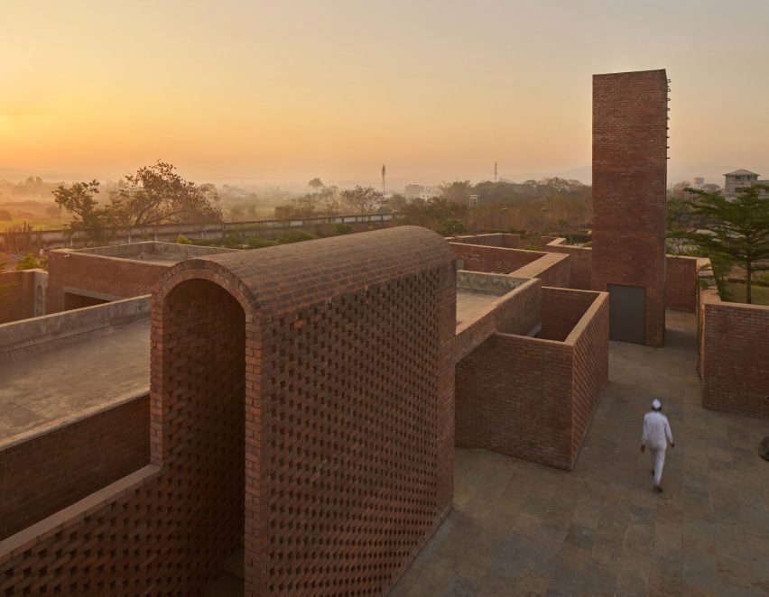 Perforated brick building by Studio VDGA